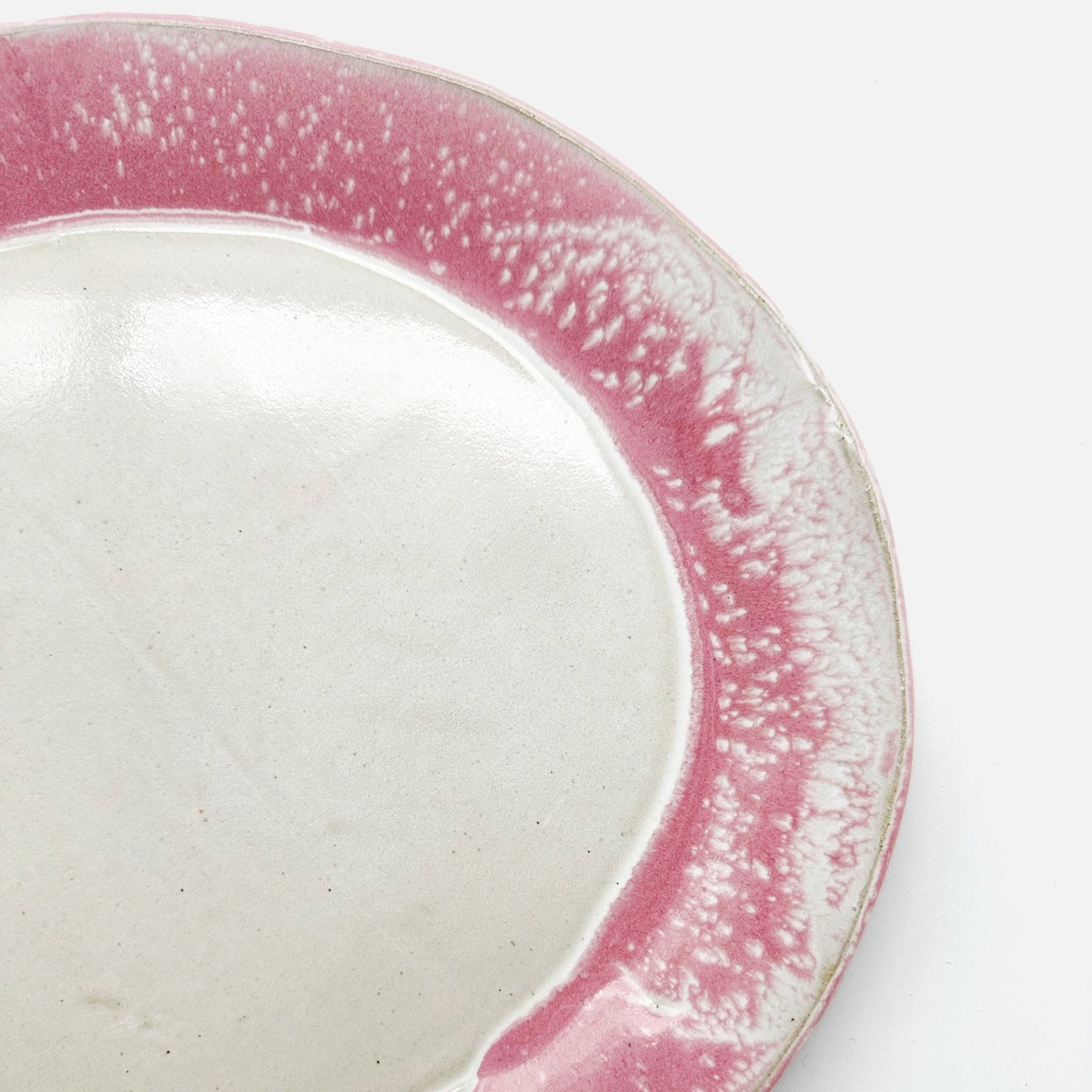 Plat de service arrondi rose