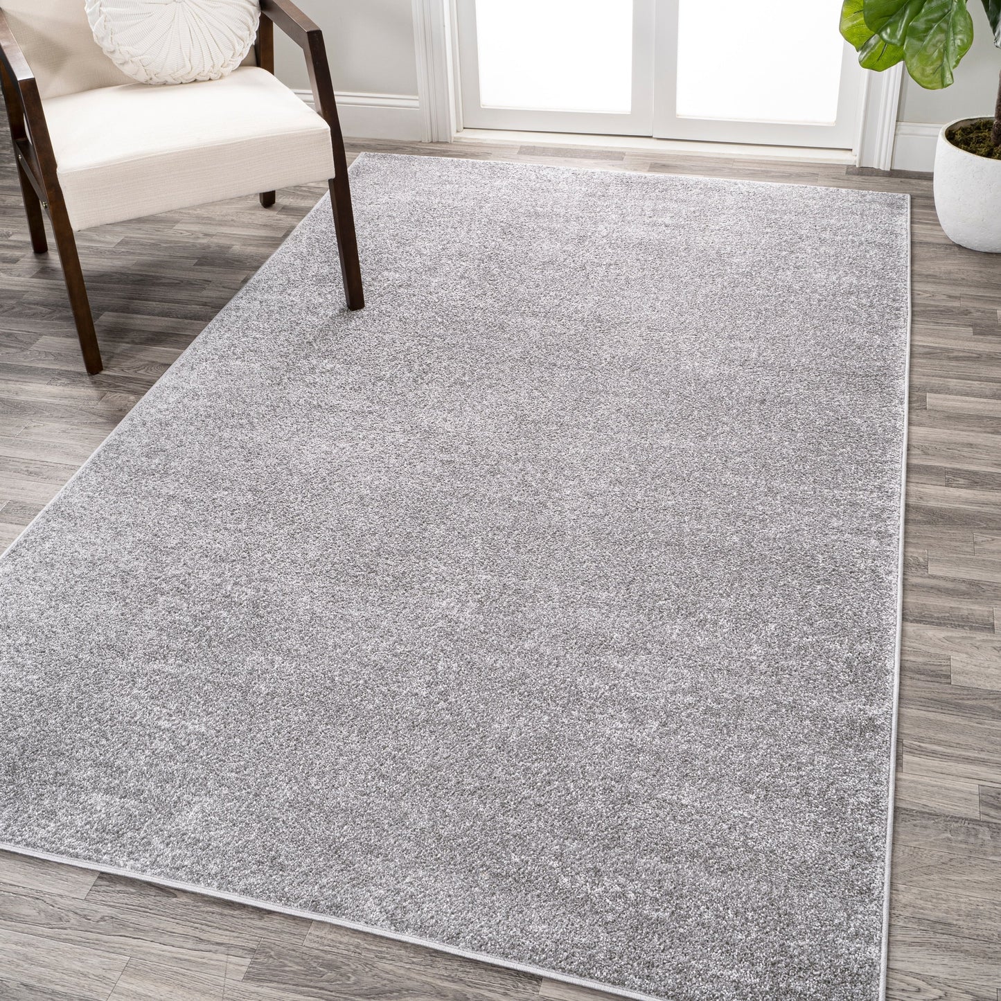 JONATHAN Y Tumbling Solid Low-Pile Area Rug