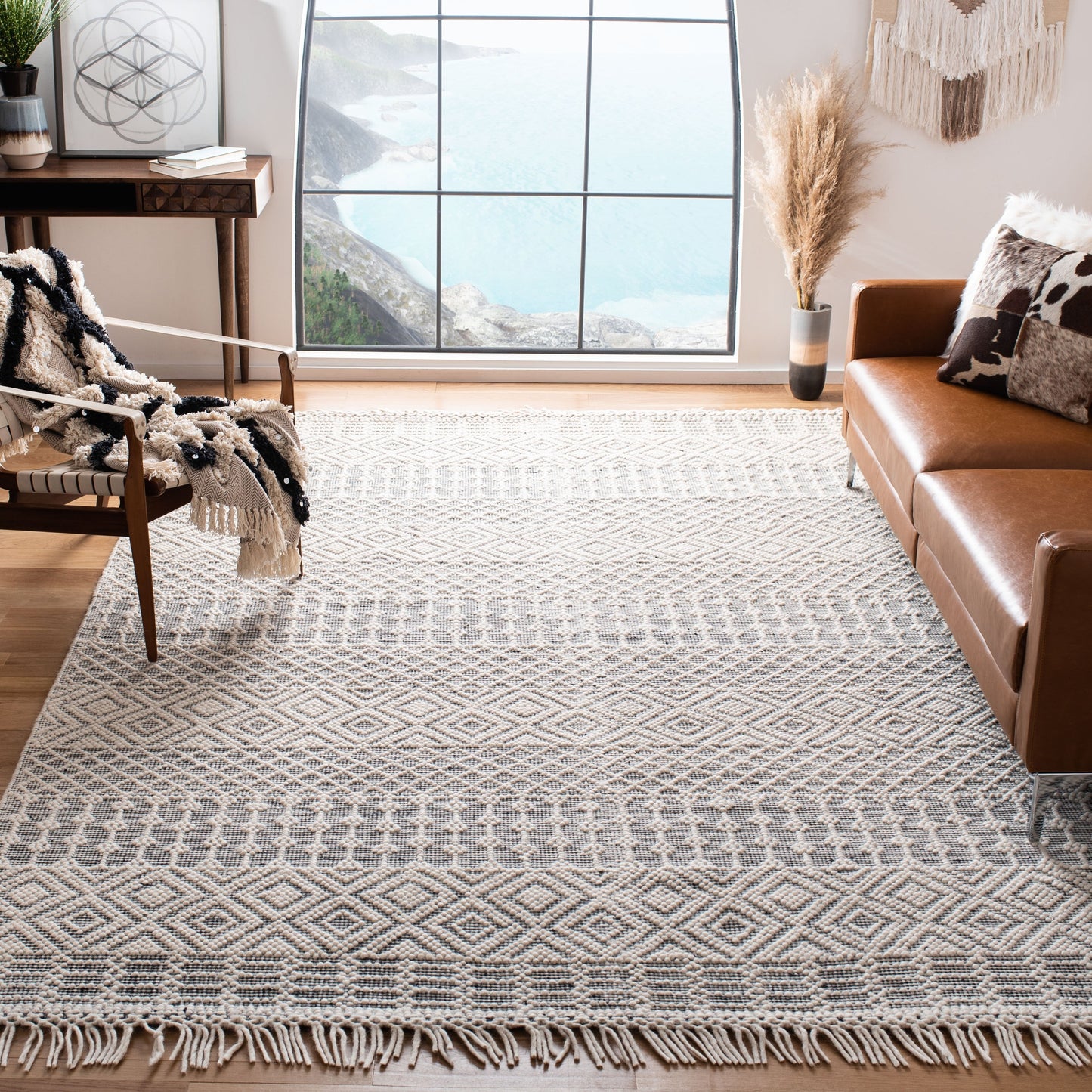 SAFAVIEH Handmade Natura Estel Wool Fringe Rug