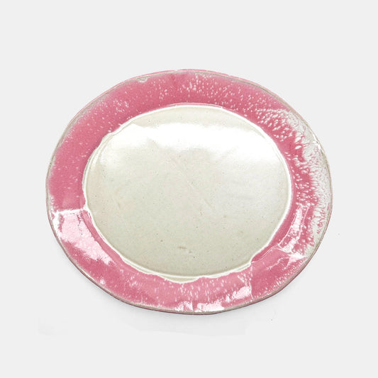 Plat de service arrondi rose