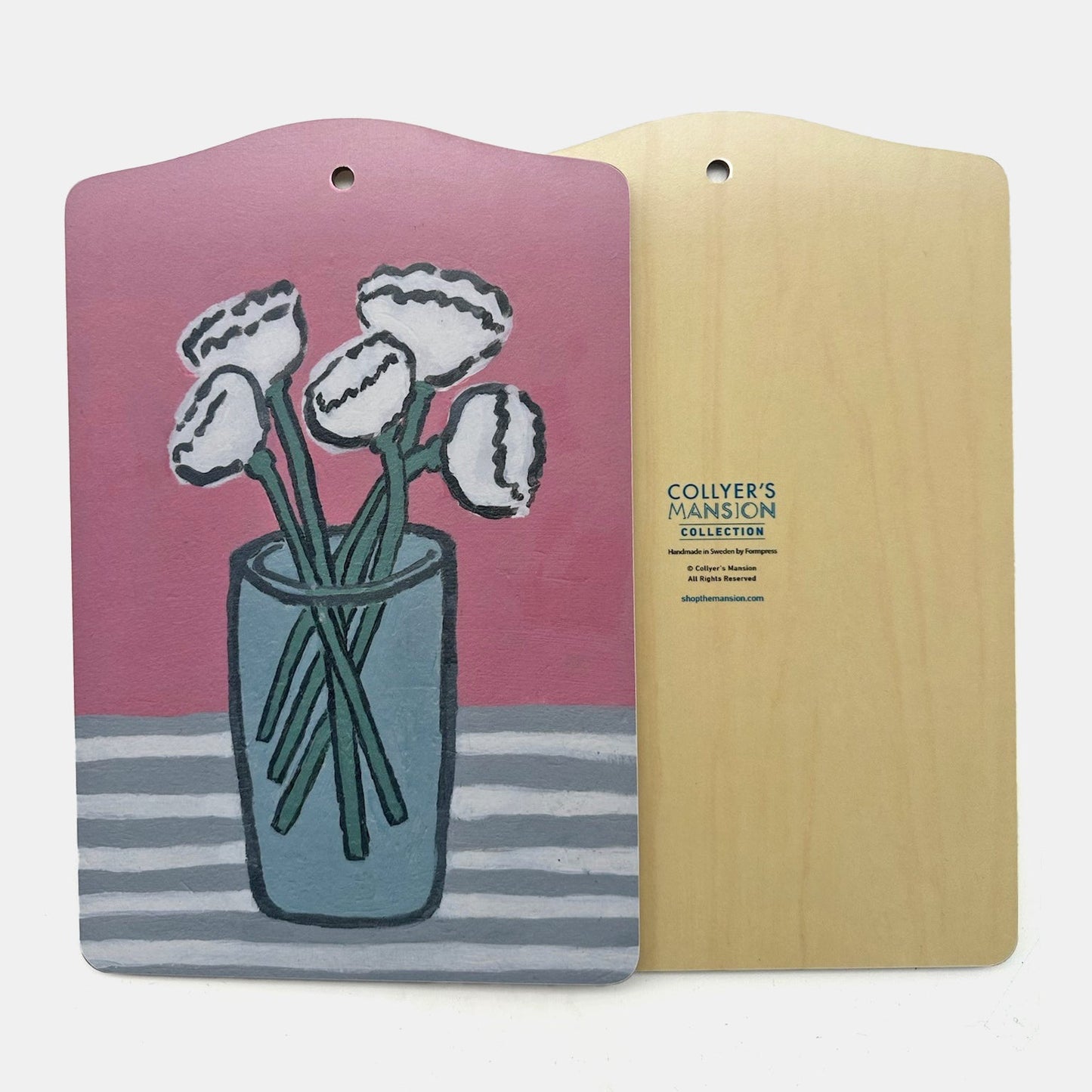 Œillets sur une planche de service rose