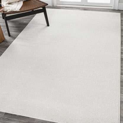 JONATHAN Y Tumbling Solid Low-Pile Area Rug