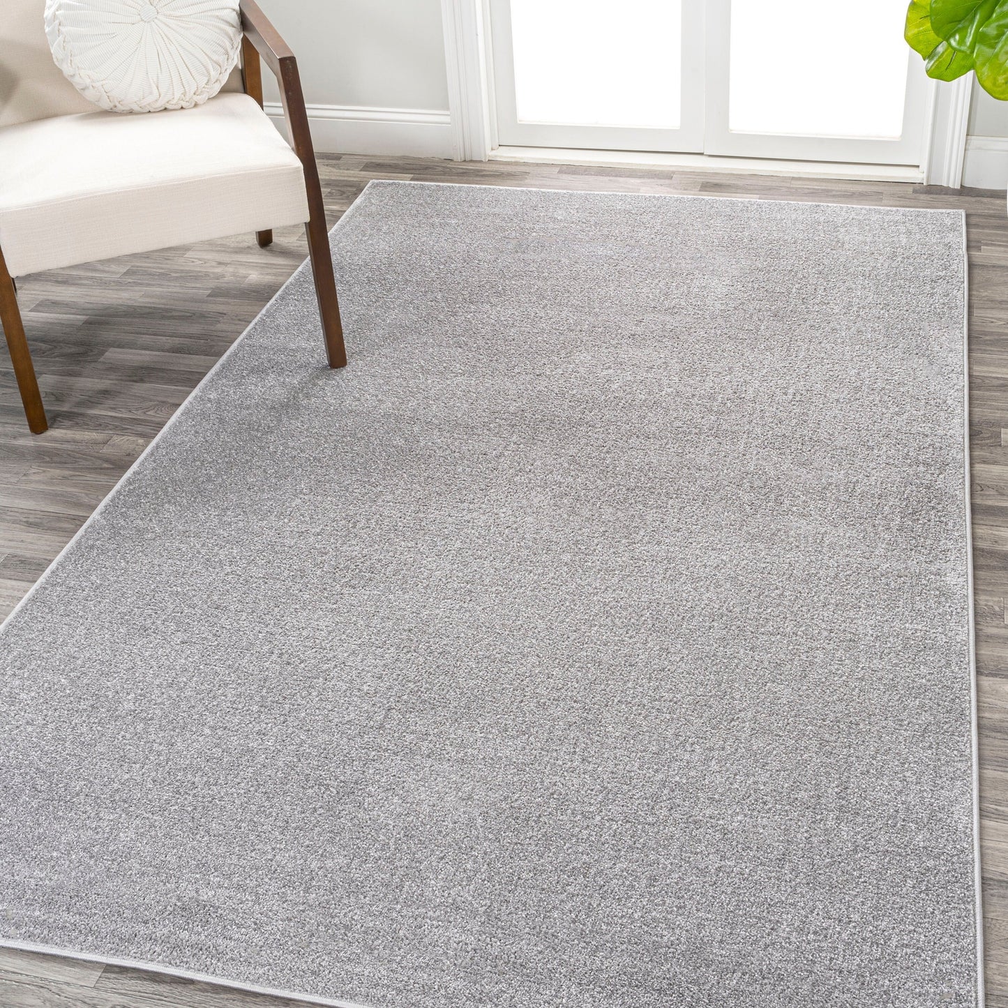 JONATHAN Y Tumbling Solid Low-Pile Area Rug