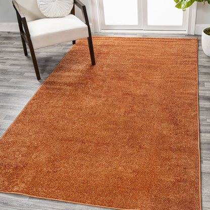 JONATHAN Y Tumbling Solid Low-Pile Area Rug