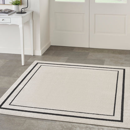 Nourison Essentials Indoor/Outdoor Solid Area Rug
