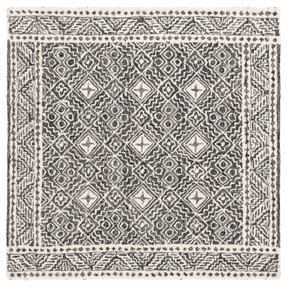SAFAVIEH Handmade Micro-Loop Lutetia Wool Rug
