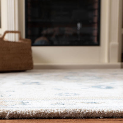 SAFAVIEH Handmade Micro-Loop Selveta Wool Rug
