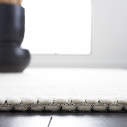 SAFAVIEH Handmade Natura Gerrita Wool Area Rug