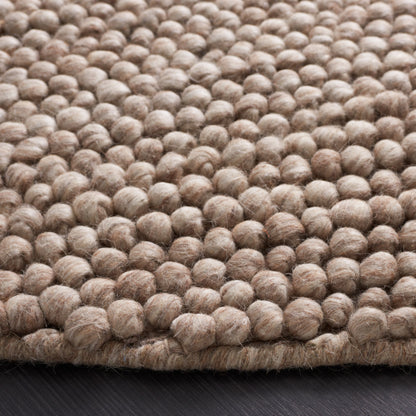 SAFAVIEH Handmade Natura Gonnie Wool Rug