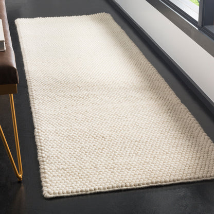 SAFAVIEH Handmade Natura Gonnie Wool Rug