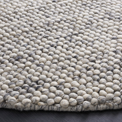 SAFAVIEH Handmade Natura Gonnie Wool Rug